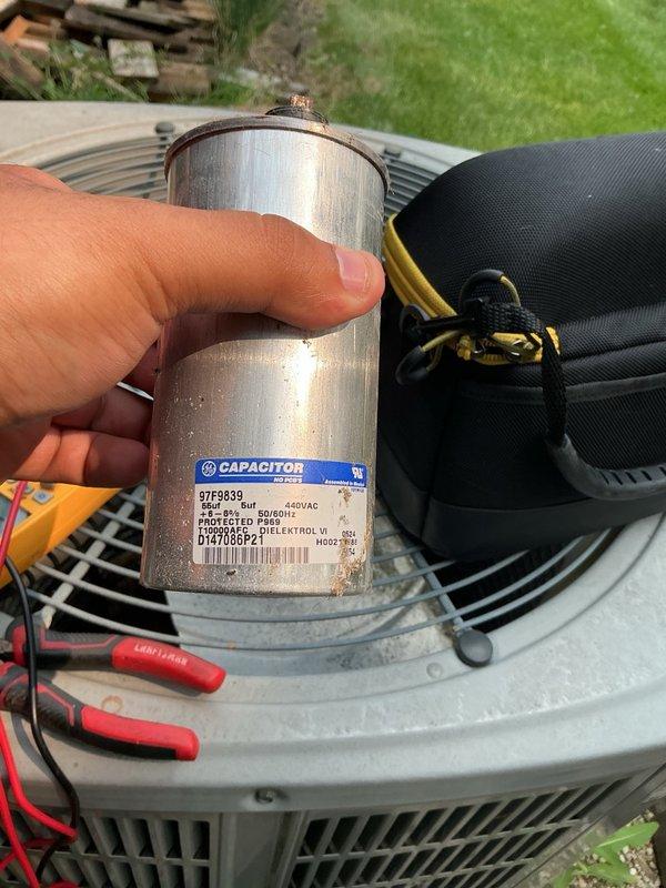Responded to no cooling complaint on residential air conditioning system. Upon arrival, performed diagnostic evaluation of outdoor condensing unit. Verified thermostat settings, checked breaker panel, and inspected air filter. Testing revealed failed dual-run capacitor preventing compressor and condenser fan motor operation. Removed defective 440VAC 37.5+5 MFD capacitor and installed new OEM replacement unit. Restored power to system, verified proper compressor startup, and confirmed condenser fan motor operation. Tested system performance and verified adequate cooling delivery at supply registers. Unit operating within normal parameters upon departure.