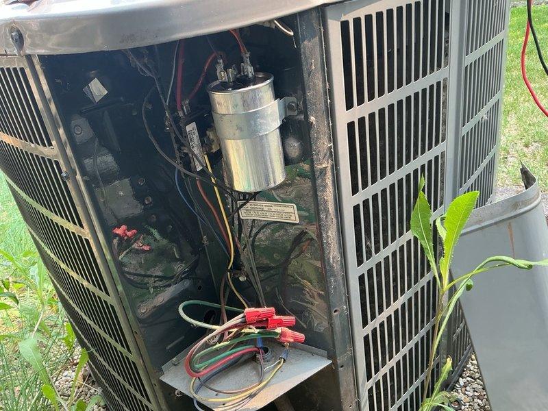 Responded to no cooling complaint on residential air conditioning system. Upon arrival, performed diagnostic evaluation of outdoor condensing unit. Verified thermostat settings, checked breaker panel, and inspected air filter. Testing revealed failed dual-run capacitor preventing compressor and condenser fan motor operation. Removed defective 440VAC 37.5+5 MFD capacitor and installed new OEM replacement unit. Restored power to system, verified proper compressor startup, and confirmed condenser fan motor operation. Tested system performance and verified adequate cooling delivery at supply registers. Unit operating within normal parameters upon departure.