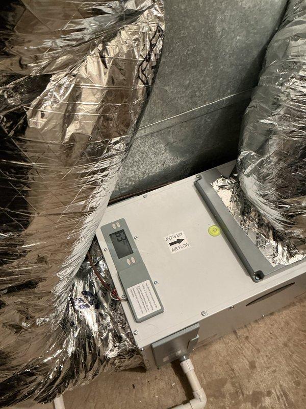 Replaced Aprilaire E100 dehumidifier under warranty with pre-authorization number A667530 for unit serial number 252025a27152. Removed failed dehumidifier from attic installation location and installed replacement unit, reconnecting to existing ductwork and electrical controls. Verified proper operation of replacement dehumidifier with digital control panel and returned defective unit to shop for warranty processing.