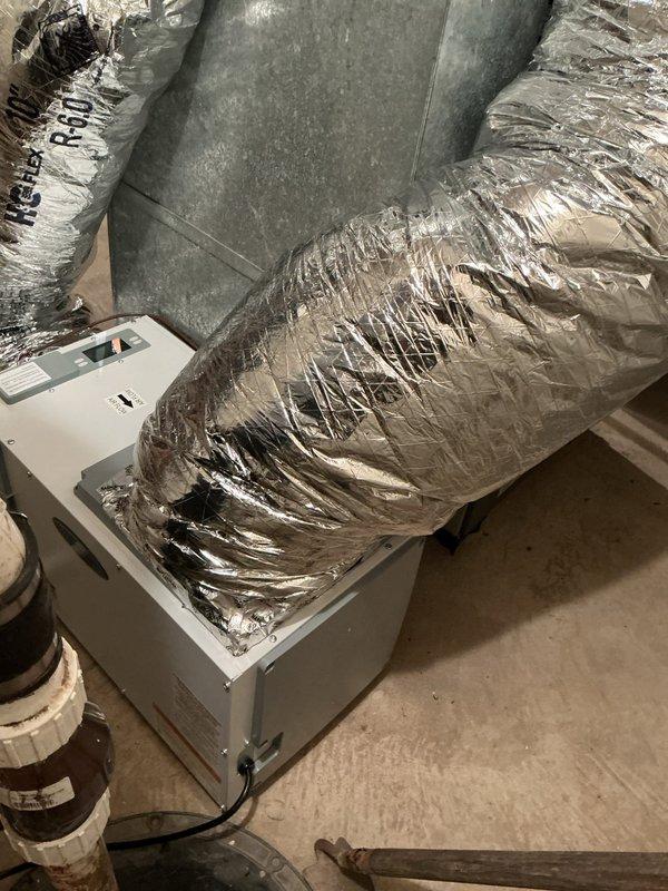Replaced Aprilaire E100 dehumidifier under warranty with pre-authorization number A667530 for unit serial number 252025a27152. Removed failed dehumidifier from attic installation location and installed replacement unit, reconnecting to existing ductwork and electrical controls. Verified proper operation of replacement dehumidifier with digital control panel and returned defective unit to shop for warranty processing.