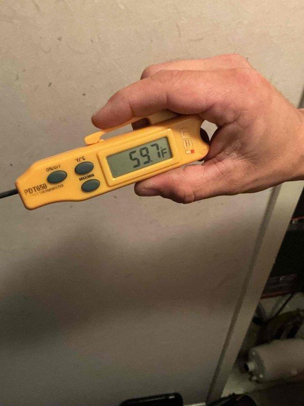Performed comprehensive clean and check maintenance on two heat pump systems per comfort plan agreement. Conducted thorough inspection of both units including temperature differential testing, amperage readings, and operational verification. Supply air temperature measured at 59.7°F with system operating properly. Electrical measurements showed 420.0 volts and 38.18 amp draw, indicating normal operating parameters. Inspected all electrical connections, thermocouple wiring, and blower assembly components. Evaluated existing steam humidifier condition and provided customer with detailed repair versus replacement options based on current system performance and anticipated longevity. All safety controls tested and verified operational. Both heat pump systems left in proper working condition with no immediate concerns noted.