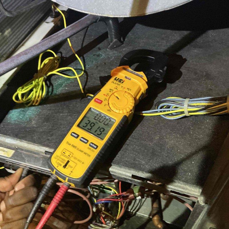 Performed comprehensive clean and check maintenance on two heat pump systems per comfort plan agreement. Conducted thorough inspection of both units including temperature differential testing, amperage readings, and operational verification. Supply air temperature measured at 59.7°F with system operating properly. Electrical measurements showed 420.0 volts and 38.18 amp draw, indicating normal operating parameters. Inspected all electrical connections, thermocouple wiring, and blower assembly components. Evaluated existing steam humidifier condition and provided customer with detailed repair versus replacement options based on current system performance and anticipated longevity. All safety controls tested and verified operational. Both heat pump systems left in proper working condition with no immediate concerns noted.