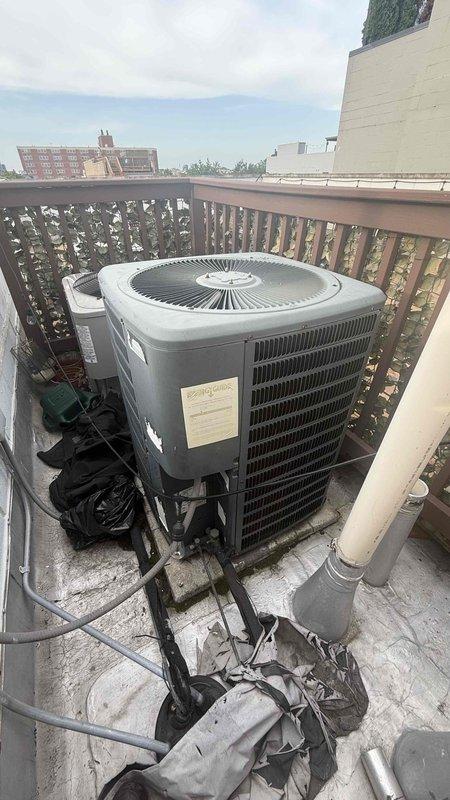 Replaced failed 1/2 HP 1075 RPM 230V totally enclosed condenser fan motor on rooftop air conditioning unit. Installation included new motor, fan blade, and dual capacitor with one-year warranty on parts and labor. System will require refrigerant pressure testing following motor replacement to determine if additional refrigerant charge or further repairs are necessary due to the unit's age, condition, and obsolete refrigerant type.