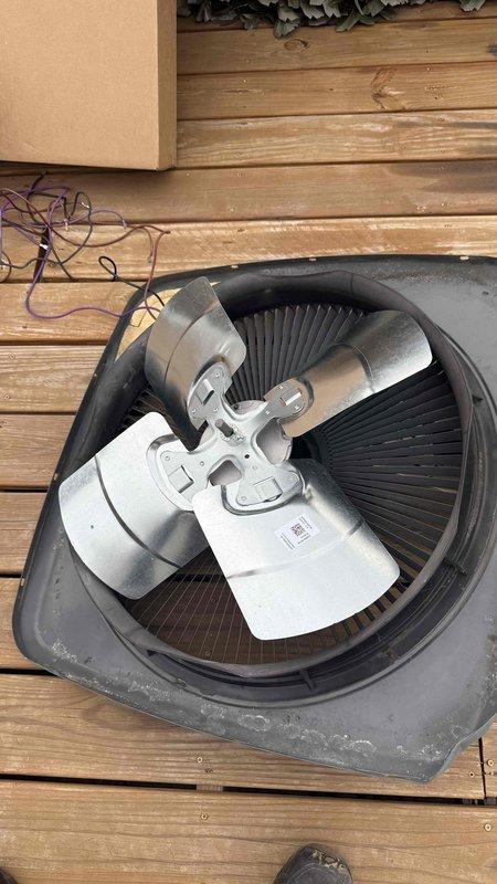 Replaced failed 1/2 HP 1075 RPM 230V totally enclosed condenser fan motor on rooftop air conditioning unit. Installation included new motor, fan blade, and dual capacitor with one-year warranty on parts and labor. System will require refrigerant pressure testing following motor replacement to determine if additional refrigerant charge or further repairs are necessary due to the unit's age, condition, and obsolete refrigerant type.
