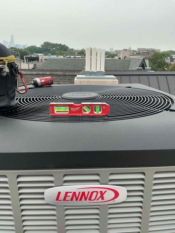 Responded to no cooling call for first floor system under warranty. Upon arrival, accessed rooftop Lennox unit and performed diagnostic evaluation. Verified unit levelness and conducted thorough inspection of equipment. System assessed and found to be operating within normal parameters following inspection. No defects identified during warranty service call.