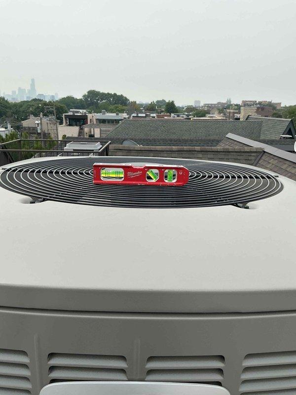Responded to no cooling call for first floor system under warranty. Upon arrival, accessed rooftop Lennox unit and performed diagnostic evaluation. Verified unit levelness and conducted thorough inspection of equipment. System assessed and found to be operating within normal parameters following inspection. No defects identified during warranty service call.