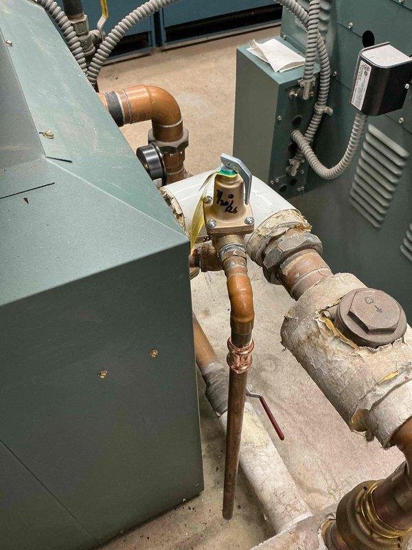 Responded to commercial facility for boiler repair. Successfully replaced faulty pressure relief valve on boiler system with new brass relief valve assembly. Verified proper installation of valve with appropriate piping connections and discharge piping routing to floor drain per code requirements. Tested system operation and confirmed relief valve functioning correctly at proper pressure settings. Collected outstanding balance on invoice for completed work.