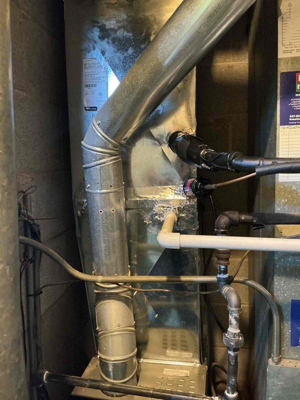 Completed full HVAC system replacement including removal and disposal of existing forced air furnace and air conditioning system. Installed new Lennox SL280UH070V36AK 66K BTU 2-stage variable speed furnace (Cat #26C63) with connections to existing supply/return ductwork, gas line, electrical circuit, and exhaust system. Reclaimed refrigerant from old AC system and installed new Lennox ML13KC1-024-230 2-ton 13 SEER2 single-stage condensing unit (Cat #25C64) with new evaporator coil. Connected to existing copper refrigerant lines, evacuated system, and charged with R454B refrigerant. Installed new standard thermostat. Performed complete start-up procedures, system testing, adjustments, and safety inspection to verify proper operation of all equipment.