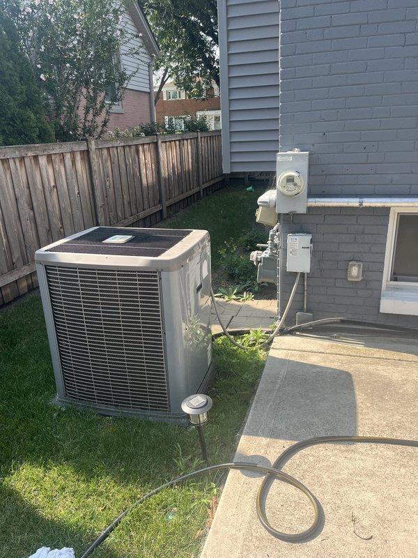 Conducted on-site assessment of existing residential HVAC system including outdoor condensing unit and attic-mounted air handler to provide replacement estimate. Documented current equipment condition through photographic documentation showing aged outdoor unit positioned on concrete pad adjacent to residential structure. Collected payment for membership program renewal and advised customer that separate invoicing would be processed through appropriate channels for the equipment replacement quote.