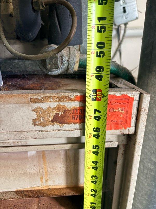 Performed initial service call and comprehensive evaluation of 30+ year old heating and cooling systems at residential property. Conducted thorough inspection of both HVAC units, documenting equipment age, condition, and operational status. Observed significant corrosion on exterior electrical components, mounting hardware, and metal housing panels. Assessed copper refrigerant lines showing oxidation and weathering consistent with equipment age. Took detailed measurements and photographs of all equipment for documentation purposes. Recorded all equipment specifications and model information for service records. Provided assessment of system viability for remainder of cooling season and discussed repair versus replacement options with property contact for tenant notification.