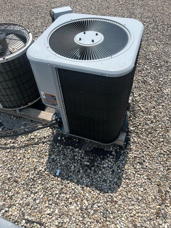 Replaced the line dryer at the air handler to restore proper system function. Evacuated the refrigerant lines to remove moisture and contaminants, then recharged the system to manufacturer specifications for optimal cooling performance. Documented the completed installation with photos showing the outdoor condenser units and refrigerant line connections.
