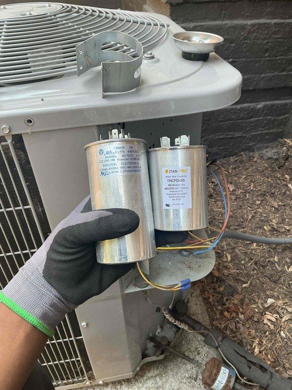 Diagnosed failed capacitor on outdoor air conditioning condenser unit. Replaced defective capacitor with new TITAN PRO THCFD-155 unit rated for proper voltage and microfarad specifications. Verified all electrical connections secure, tested system operation, and confirmed unit returned to normal cooling function.