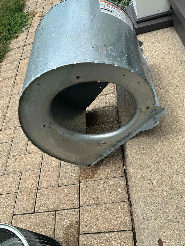 Performed blower wheel cleaning service on HVAC unit. Removed blower assembly from housing, thoroughly cleaned accumulated debris and dust from squirrel cage fan blades and interior plenum chamber, and reinstalled components to restore proper airflow and system efficiency.