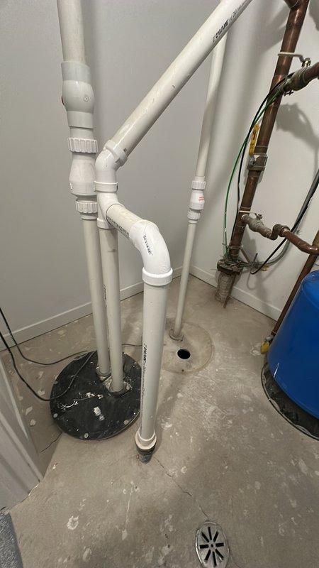 Completed comprehensive HVAC maintenance estimate for 12-unit condominium building including both common area and individual unit systems. Assessed main building system mounted on exterior wall requiring elevated access, along with individual HVAC units located in each unit's utility closet. Documented existing equipment conditions including rooftop ventilation components, air conditioning units with metal mesh grilles, basement utility room plumbing connections, and individual unit mechanical systems to develop full-service maintenance proposal for building-wide climate control infrastructure.