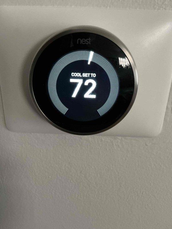 Completed Comfort Plan Clean and Check maintenance on a 24-year-old outdoor air conditioning unit. Performed comprehensive system inspection including electrical components, capacitor, contactor, and thermostat operation. Identified heavy dirt and debris accumulation on evaporator coils requiring attention. Verified Nest thermostat functionality with system set to cool at 72 degrees and operating properly. Collected payment for Comfort Plan renewal.