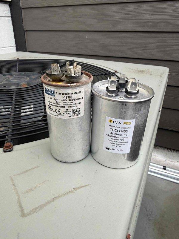 Responded to service call for 18-year-old HVAC system with failed capacitor. Upon inspection, found original JARD capacitor exhibiting significant corrosion and rust on terminal connections, indicating end of service life. Disconnected power to condensing unit, removed deteriorated capacitor, and installed new TITAN PRO TRCFD455 replacement capacitor with proper electrical specifications. Verified all wire connections were secure to capacitor terminals and contactor. Restored power, tested system operation, and confirmed proper startup and cooling cycle functionality.