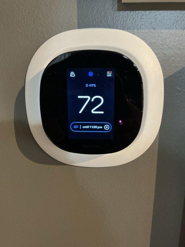 Responded to service call for malfunctioning thermostat. Upon arrival, evaluated smart programmable thermostat and verified proper communication with HVAC system located in utility closet. Confirmed thermostat display functioning correctly, showing current temperature of 72°F with programmed schedule active until 1:30 pm setpoint of 67°F. Tested system operation, checked wiring connections at thermostat and furnace terminal board, and verified proper system response to temperature calls. Documented equipment information including furnace unit and water heater in mechanical closet, photographed installation for service records, presented maintenance plan options, and discussed available promotions for new customers.