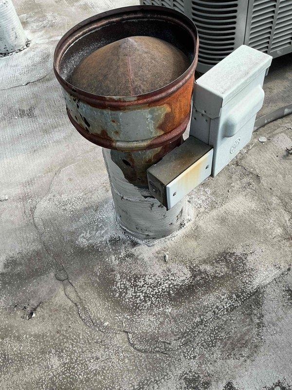 Completed comprehensive maintenance on residential HVAC system including air conditioning unit and furnace for customer who recently moved into property. Performed standard tune-up procedures on both systems, documented equipment conditions with photographs showing indoor furnace installation with associated piping and controls, as well as outdoor condensing unit. Noted significant rust and corrosion on outdoor cylindrical component and weathering on concrete pad, with condensation present on indoor ductwork indicating system operation.