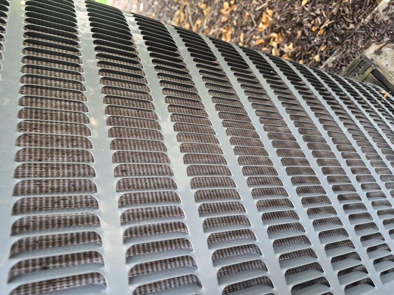 Responded to no cooling complaint on 2017 residential air conditioning system. Customer reported previous refrigerant additions and suspected low R410a charge. Upon arrival, verified thermostat settings on Nest unit showing cooling mode with setpoint at 70°F and current temperature reading of 85°F. Performed visual inspection of outdoor condensing unit and conducted standard diagnostic procedures to assess system performance and identify root cause of cooling deficiency.