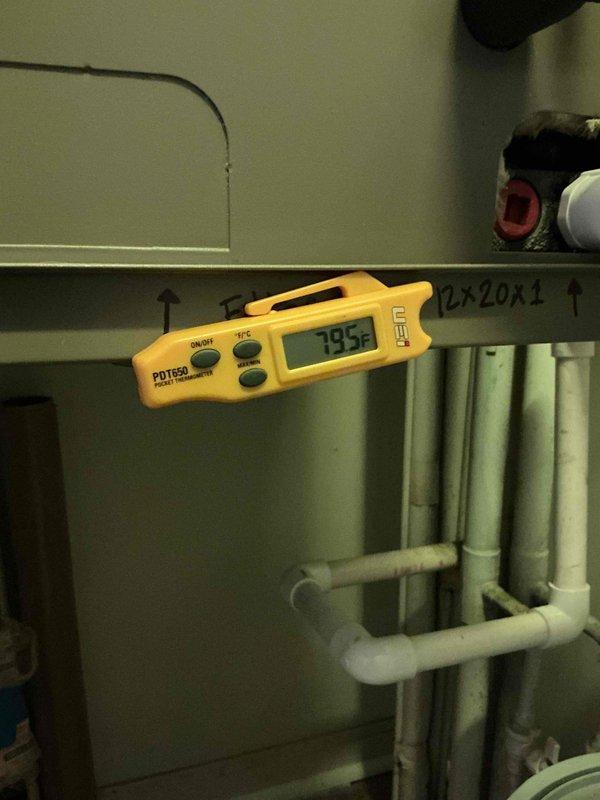 Responded to no cooling complaint on recently installed air conditioning system. Upon arrival, performed diagnostic evaluation of thermostat operation and system performance. Verified thermostat settings on Honeywell ProSeries programmable unit, confirming proper configuration for cooling mode. Measured supply air temperature at air handler using differential thermometer, recording 79.5°F reading. System found to be operating but not achieving adequate cooling performance, indicating potential refrigerant charge issue or airflow restriction requiring further diagnosis and repair.