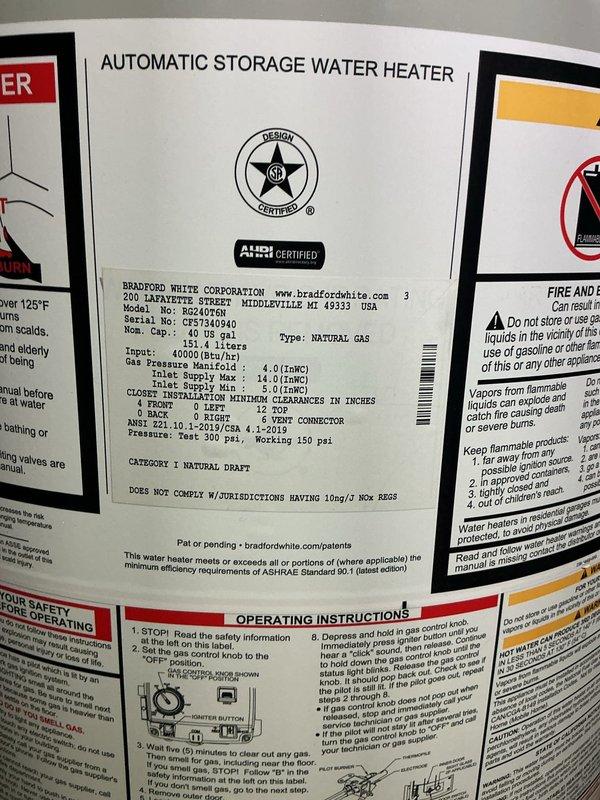 Successfully removed and disposed of the existing water heater from the basement, then installed a new Bradford White 40-gallon natural gas water heater (model BG240T6N) in the same location. Connected the unit to existing gas line, electrical supply, water supply piping, and exhaust chimney venting system using copper piping and brass fittings. Performed complete start-up procedures, tested all connections for proper operation and safety, and verified system functionality upon completion.