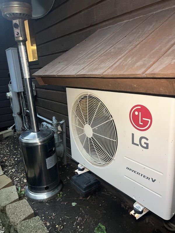 Conducted on-site assessment for replacement of existing mini-split system consisting of five total units. Current equipment includes aging LG inverter outdoor condenser with associated refrigerant lines and indoor wall-mounted air handler in kitchen area. Both units remain operational but are showing age. Documented existing installation configuration including outdoor unit placement on concrete pad with refrigerant accumulator, copper and aluminum line sets with insulation, and indoor evaporator mounted above cabinetry near vaulted ceiling. Customer expressed preference for Mitsubishi equipment for complete system replacement. Provided estimate for removal of existing units and installation of new Mitsubishi mini-split system.