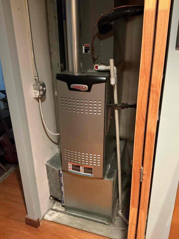 Completed comprehensive clean and check maintenance service on single-zone HVAC system per comfort plan agreement. Performed thorough inspection and preventive maintenance on Lennox furnace unit located in interior utility closet and rooftop air conditioning condensing unit. Inspected all mechanical components, electrical connections, refrigerant lines, condensate drainage system, and gas line connections. Verified proper operation of both heating and cooling equipment, checked system controls and safety devices, cleaned accessible components, and confirmed all connections are secure and functioning within manufacturer specifications. System operating normally with no deficiencies noted at time of service completion.