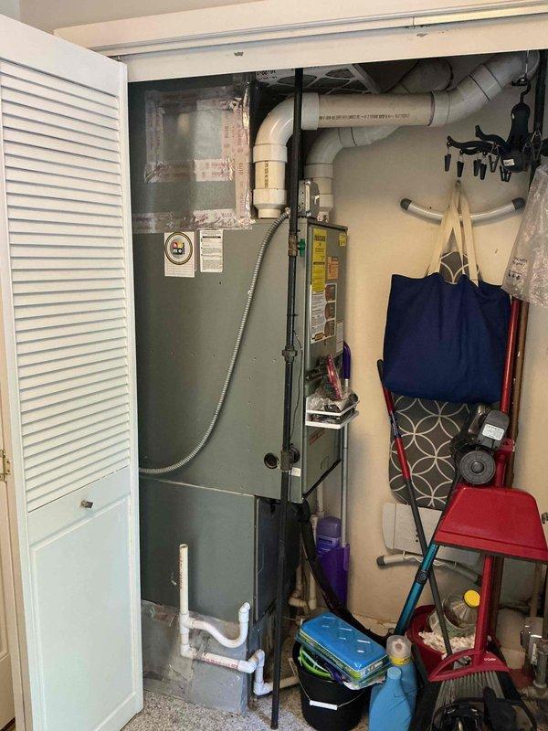 Completed comprehensive clean and check maintenance service on two HVAC systems per comfort plan agreement. Performed thorough inspection of both air conditioning units including electrical connections, refrigerant levels, condenser coils, and air handler components. Cleaned accessible components, verified proper system operation, and documented equipment conditions with photographs of control panels and indoor air handler installation.
