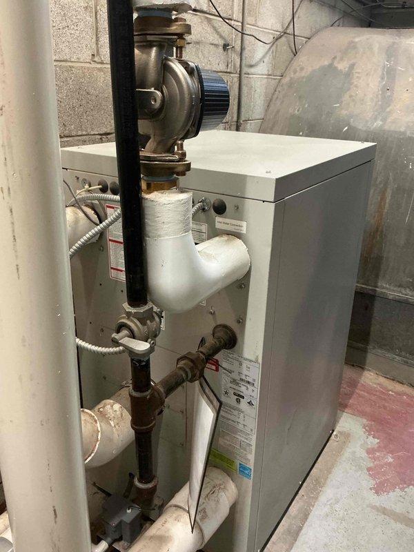 Responded to emergency service call for commercial building without hot water for 24 hours due to dual boiler system failure. Inspected both commercial boiler units, associated circulating pumps, piping connections, and control systems in mechanical room. Diagnosed issue, coordinated approval through property management, and restored hot water service to the building.