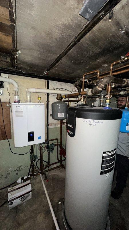 Conducted site assessment of existing NTI boiler system to provide estimate for adding new heating zone and radiator installation. Documented current mechanical room configuration including wall-mounted boiler unit, cylindrical storage tank, expansion tank, and associated copper piping infrastructure. Evaluated existing heating distribution system and available connection points for proposed zone addition, noting all equipment previously installed by our company remains in operational condition.