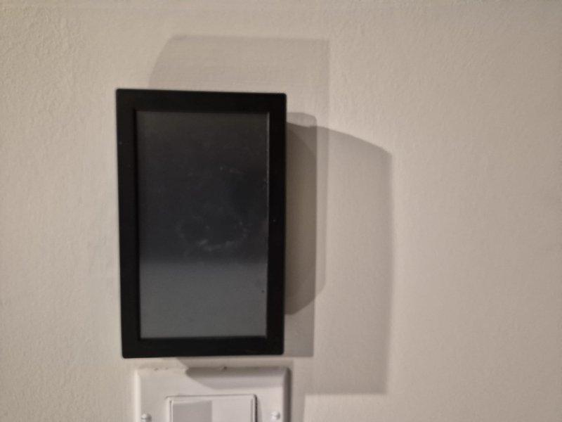 Responded to no cooling call with blank thermostat display. Upon arrival, found wall-mounted thermostat powered off and Aprilaire control board with no active display. Verified thermostat wiring connections at control board, confirmed proper wire terminations on circuit board terminals, and checked system breakers. Diagnosed loss of power to thermostat and control system, restored power to equipment, and verified proper LED indicator illumination on Aprilaire controller. System operational with thermostat display functioning and cooling cycle initiated successfully.