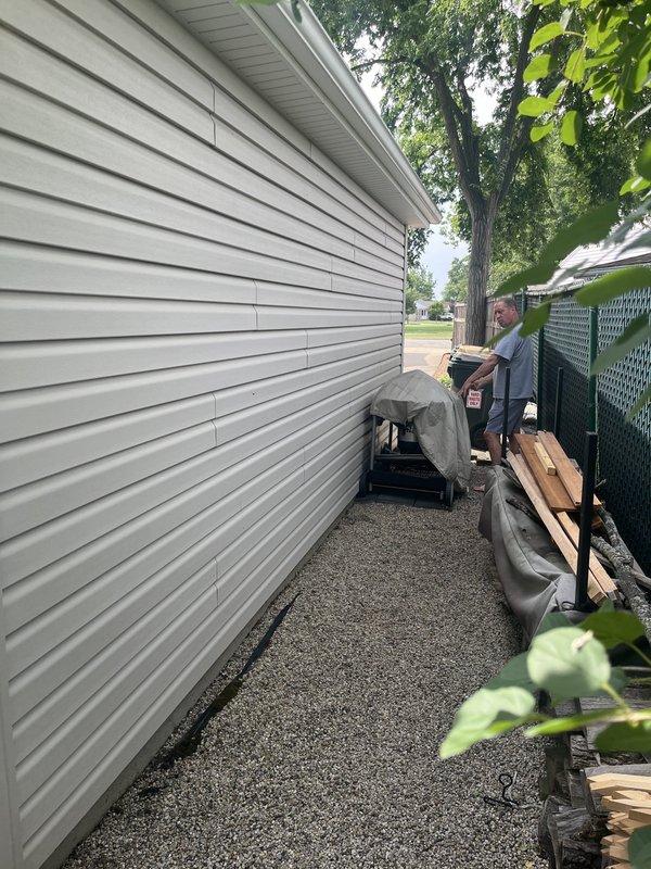 Conducted on-site evaluation for new air conditioning system installation at residential property. Customer currently without existing AC unit. Assessed exterior wall clearances, electrical service accessibility, and optimal equipment placement locations along side yard area. Documented installation site conditions including available space for outdoor condensing unit, proximity to electrical panel, and potential routing pathways for refrigerant lines and condensate drainage. Provided comprehensive estimate for complete AC system installation tailored to property specifications and customer scheduling preferences.