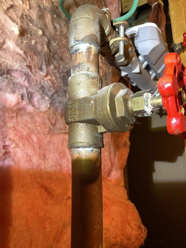 Replaced 50-gallon residential tank water heater in basement utility area. Removed existing unit and installed new water heater with proper venting and code-compliant connections. Connected hot and cold water supply lines using copper piping with brass fittings and shutoff valves. Installed temperature and pressure relief valve with appropriate discharge piping. Verified all connections for leaks, tested unit operation, and confirmed proper heating function. Secured payment information and received lockup instructions as customer needed to leave before completion. All work performed to manufacturer specifications and local plumbing codes.
