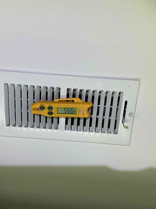 Completed Comfort Plan clean and check service on two air conditioning systems. Performed electrical diagnostics with clamp meter showing 77.7 amp draw, measured supply air temperature at 56.6°F at register, and collected payment for annual Comfort Plan renewal.