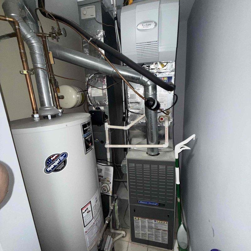 Completed comprehensive Comfort Plan clean and check service on single-system Lennox air conditioning unit with indoor furnace air handler. Performed full inspection of outdoor condenser unit including cleaning of coils, verification of refrigerant charge levels, testing of electrical components and capacitor, and confirmation of proper fan motor operation. Inspected indoor air handler and ductwork system in mechanical closet, checked airflow, replaced air filter, and verified proper operation of all safety controls and thermostat communication. All equipment found operating within manufacturer specifications with no deficiencies noted. System tested and left in proper working order per scheduled maintenance protocol.