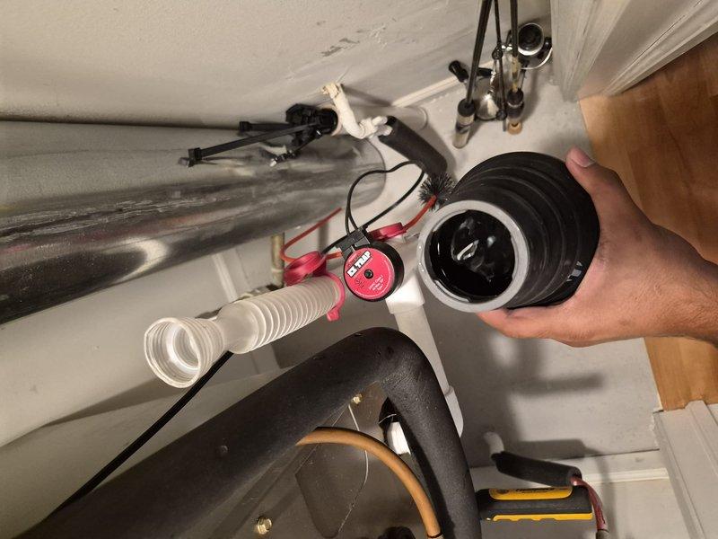 Completed annual Comfort Plan clean and check maintenance on single HVAC system. Performed comprehensive inspection of air handler components, verified thermostat operation displaying 80°F setpoint with system running in cooling mode at 74°F, and inspected condensate drain assembly including trap and discharge piping to ensure proper drainage and system functionality.