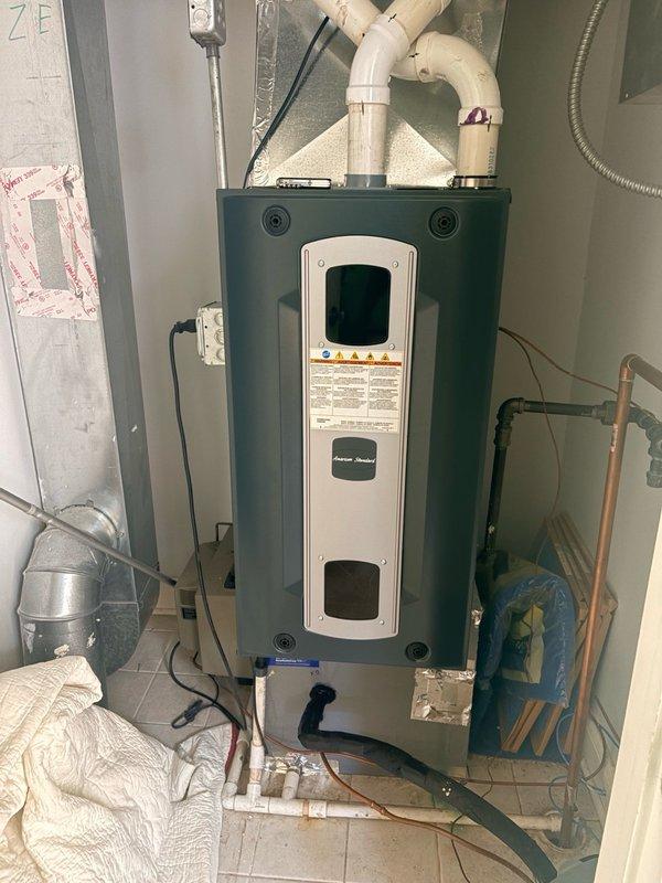 Responded to customer report of recurring leak following initial warranty visit. Performed comprehensive leak detection using electronic sniffer and bubble solution on all refrigerant connections and evaporator coil. Inspected water heater installation, PVC condensate drain lines, and all associated plumbing connections. Verified ecobee thermostat operation and system performance at 78°F setpoint. System monitored under operating conditions with customer advised to report if leaking reoccurs, at which point ceiling access will be required to identify source and determine warranty coverage.