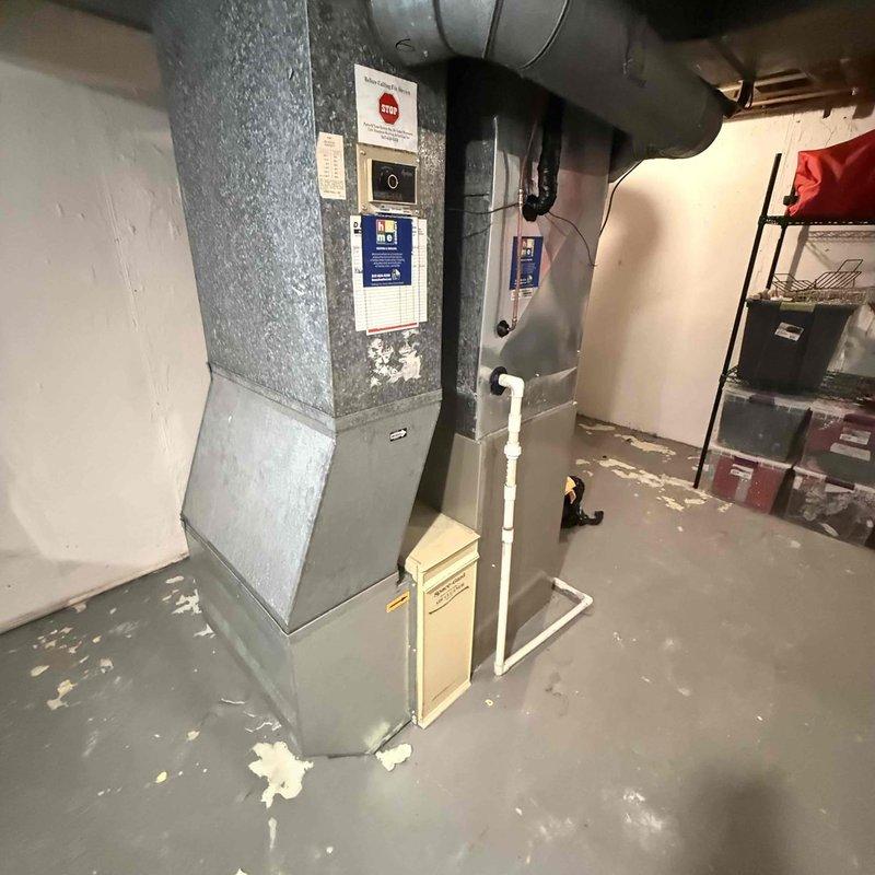 Completed annual cooling system tune-up and maintenance on a 9-year-old air conditioning system. Performed comprehensive inspection of indoor air handler unit in basement, checked all electrical connections and measured amperage draw at 9.2 amps on outdoor condensing unit, verified proper refrigerant levels, inspected condensate drainage system, and confirmed all components operating within manufacturer specifications.