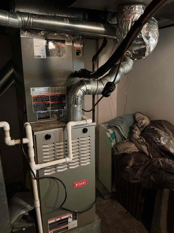 Completed full system replacement by reclaiming existing refrigerant from old condenser, coil, and line-set, then disconnecting and disposing of obsolete equipment. Installed new Lennox 13 SEER2 air conditioning condensing unit (Model ML13KC1-030-2P, Cat #25C67) on new pad with pea gravel leveling, along with matching evaporator coil connected to existing copper refrigerant lines. Evacuated system to remove moisture and air, then charged with R454B refrigerant to manufacturer specifications. Installed refrigerant detection system on existing Bryant furnace to meet current safety codes. Performed complete start-up procedures, operational testing, system adjustments, and comprehensive safety inspection to verify proper function of all components.