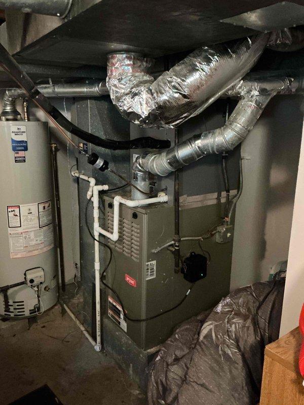 Completed full system replacement by reclaiming existing refrigerant from old condenser, coil, and line-set, then disconnecting and disposing of obsolete equipment. Installed new Lennox 13 SEER2 air conditioning condensing unit (Model ML13KC1-030-2P, Cat #25C67) on new pad with pea gravel leveling, along with matching evaporator coil connected to existing copper refrigerant lines. Evacuated system to remove moisture and air, then charged with R454B refrigerant to manufacturer specifications. Installed refrigerant detection system on existing Bryant furnace to meet current safety codes. Performed complete start-up procedures, operational testing, system adjustments, and comprehensive safety inspection to verify proper function of all components.