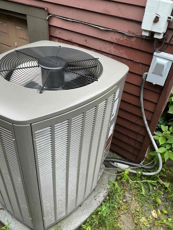 Completed Gold Clean and Check for Cooling on one air conditioning system per recurring maintenance agreement. Performed comprehensive inspection of outdoor condenser unit, including cleaning of coils, verification of refrigerant levels, and testing of electrical components. Noted vegetation growth around unit base and recommended clearance maintenance for optimal airflow and system efficiency.