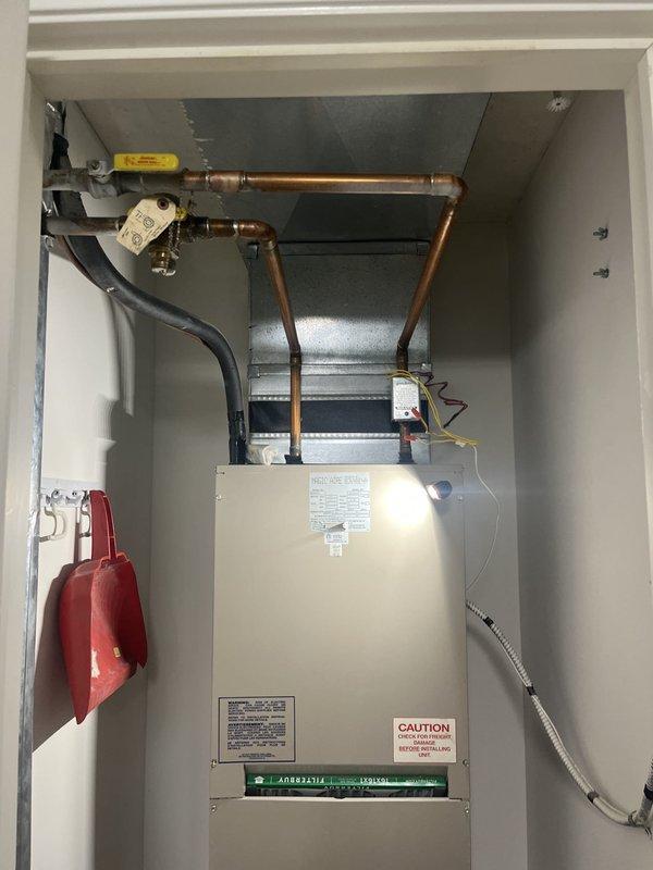 Conducted comprehensive estimate for complete air conditioning and air handler replacement system at residential property. Inspected existing Magic Aire air handler unit (Model PS-AK-B-27) located in interior utility closet, documented current equipment specifications including 115V single-phase operation with 1/3 HP motor, and assessed refrigerant line connections, electrical wiring, and ductwork configuration. Customer inquired about seasonal group replacement specials typically offered during fall and spring promotional periods.