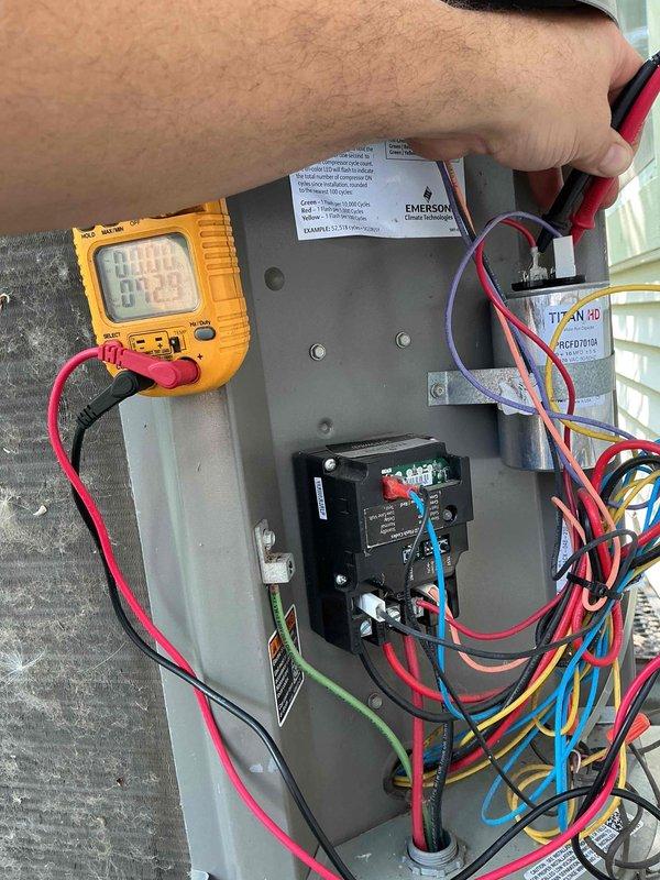 Completed annual cooling maintenance and tune-up on 11-year-old Lennox air conditioning system per gold comfort plan agreement. Performed comprehensive clean and check service including electrical diagnostics with multimeter testing of control board components, capacitor inspection of TITAN HD unit, verified all wire connections and terminals, and tested system operation. Confirmed Nest thermostat functionality with proper communication to cooling system, set point at 72°F operating correctly. System running within manufacturer specifications with all safety controls functioning properly.