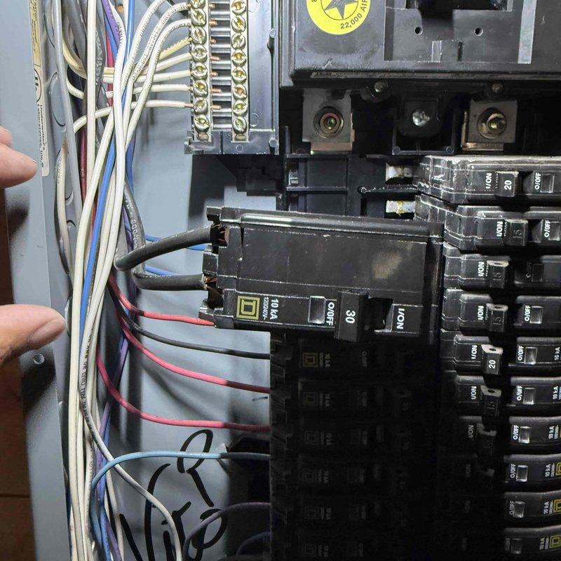 Completed warranty service by replacing an oversized 40-amp circuit breaker with the properly rated 30-amp breaker in the electrical panel. Verified electrical measurements and confirmed system operating within correct parameters upon completion.