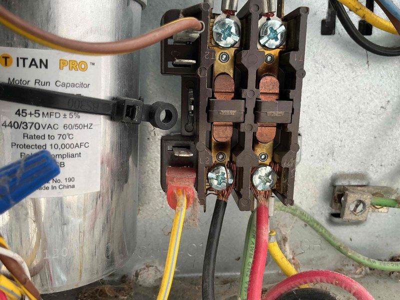 Completed spring preventive maintenance on air conditioning system per comfort plan agreement. Performed comprehensive clean and check service including inspection of electrical components, capacitor testing showing 45+5 MFD dual run capacitor operating within specifications, verified contactor connections secure with proper wire terminations, and measured system temperatures with discharge line reading 91°F indicating normal refrigerant operation. All components found functioning properly with no deficiencies noted.