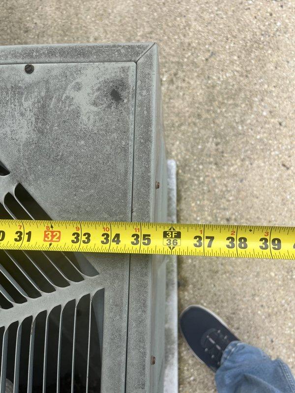 Responded to service call for non-operational cooling system on 33-year-old Ruud unit. Performed comprehensive visual inspection and documentation of outdoor condensing unit, noting significant age-related weathering and dust accumulation on galvanized metal housing. Measured unit dimensions and assessed overall equipment condition, observing normal outdoor wear patterns consistent with three decades of operation. Documented installation configuration including concrete pad placement, electrical conduit routing, and proximity to building structure. Given the advanced age of the equipment, provided estimate for system replacement options to restore cooling capability.