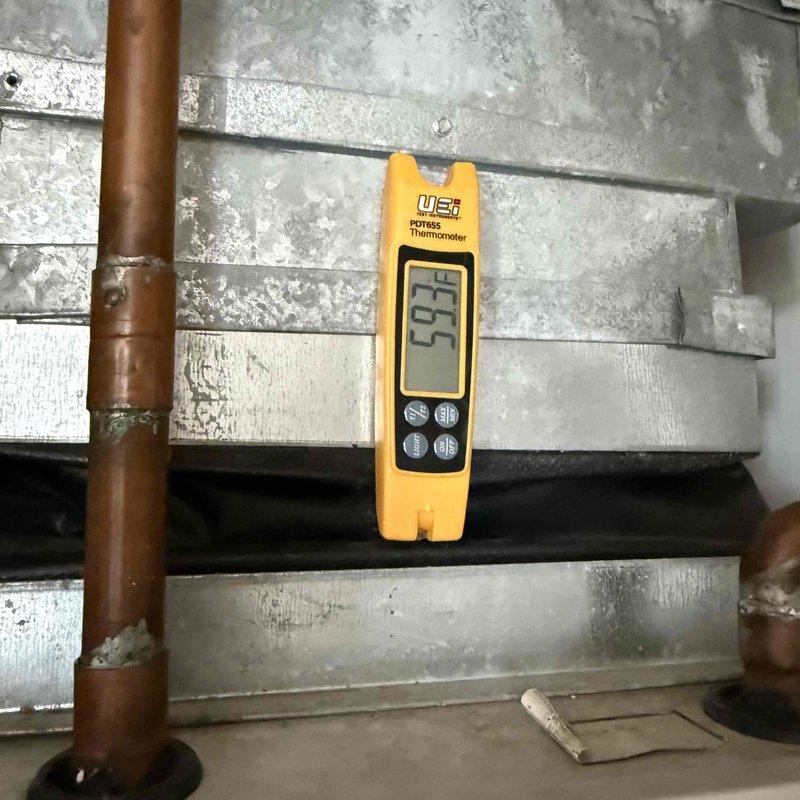 Responded to new customer service call for reported air handler water leak in utility closet. Upon inspection, located active leak at air handler drain system. Measured supply air temperature at 55°F confirming unit operation. Identified condensate drainage issue causing water accumulation around air handler and water heater area. Addressed leak source, verified proper drainage function, and confirmed system returned to normal operation without further water discharge.
