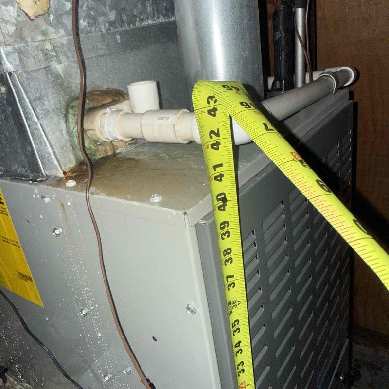 Responded to no cooling complaint with system unable to maintain setpoint of 75°F, actual temperature reading 78-79°F. Outdoor unit confirmed operational with condenser fan running. Upon inspection, discovered indoor air handler blower motor failure resulting in no airflow from supply registers. Measured amperage at 35.6A on system components during diagnostic testing. Verified thermostat properly calling for cooling and confirmed outdoor condensing unit responding appropriately. Identified failed blower motor as root cause preventing conditioned air distribution throughout living space while compressor and outdoor unit continued normal operation.