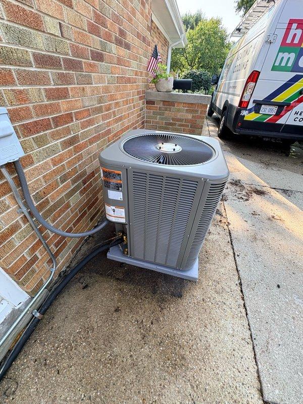 Completed full replacement of 3-ton air conditioning system including outdoor condensing unit and indoor evaporator coil. Installed new outdoor unit on existing concrete pad with proper refrigerant line connections and secured copper line set to exterior brick wall with mounting brackets. Replaced indoor evaporator coil assembly within existing furnace plenum, ensuring proper integration with heating system. Installed EcoBee thermostat as system control upgrade and left existing Nest thermostat with customer per job specifications. Verified all refrigerant connections, tested system operation, and confirmed proper cooling performance upon completion.