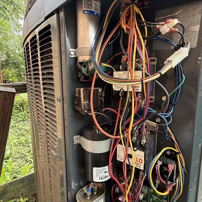 Completed Platinum Clean and Check service on residential cooling system and electronic air cleaner per preventive maintenance agreement. Inspected and serviced outdoor condensing unit, including cleaning of condenser coil, verification of electrical connections and capacitor operation, and assessment of compressor function. Replaced two HVAC air filters at indoor unit location and verified proper airflow throughout system. All components found operating within normal parameters with no deficiencies noted at time of service.